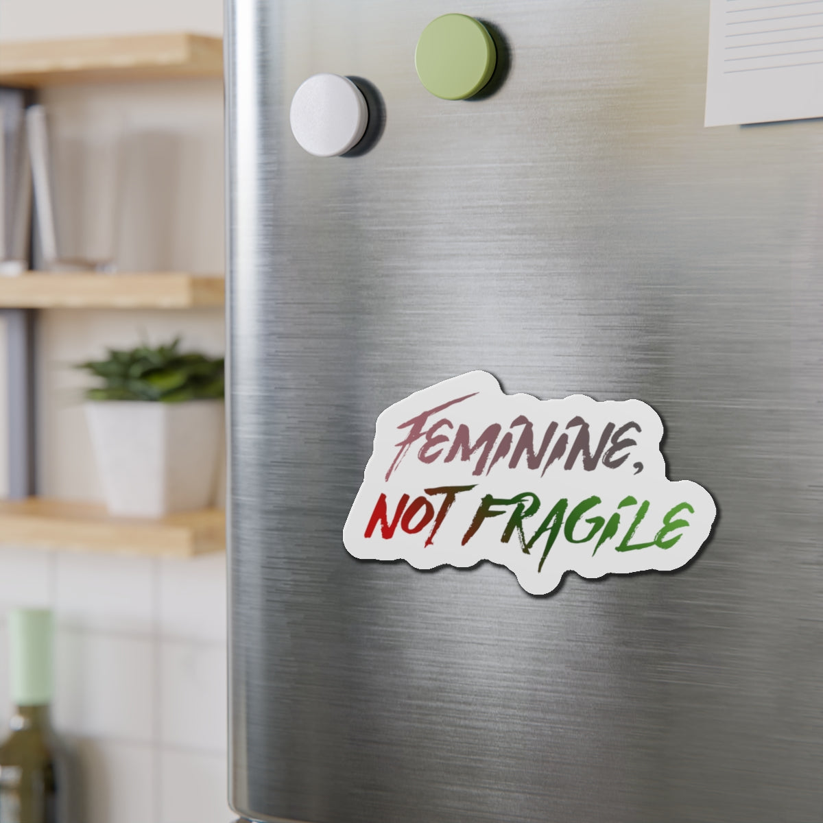 Feminine, Not Fragile Sticker